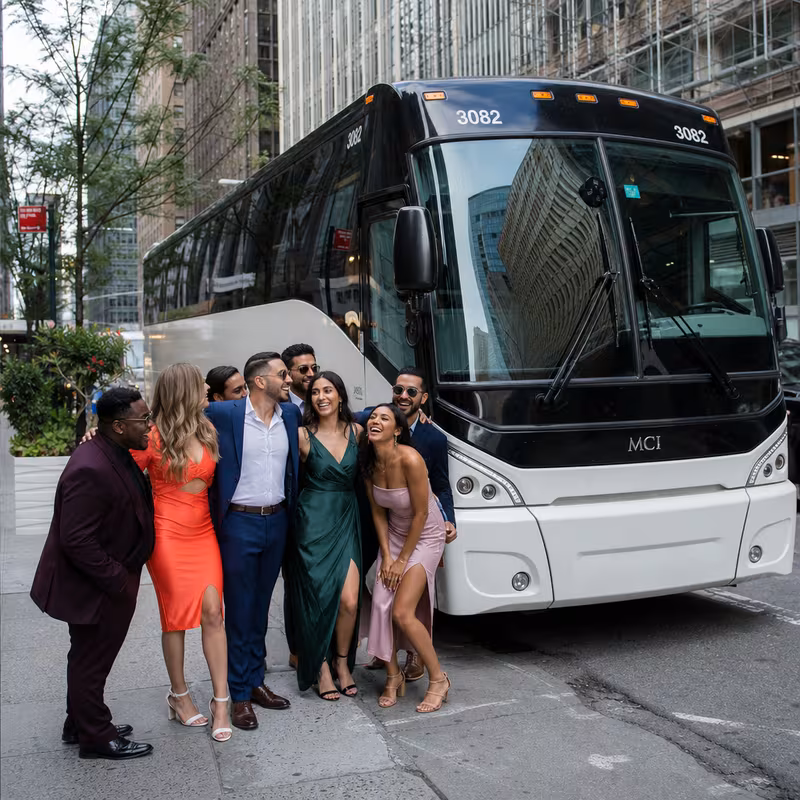 Passengers loading luggage while boarding an New York group shuttle