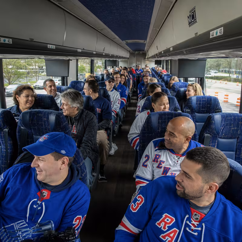Passenger seating aboard a New York party bus rental