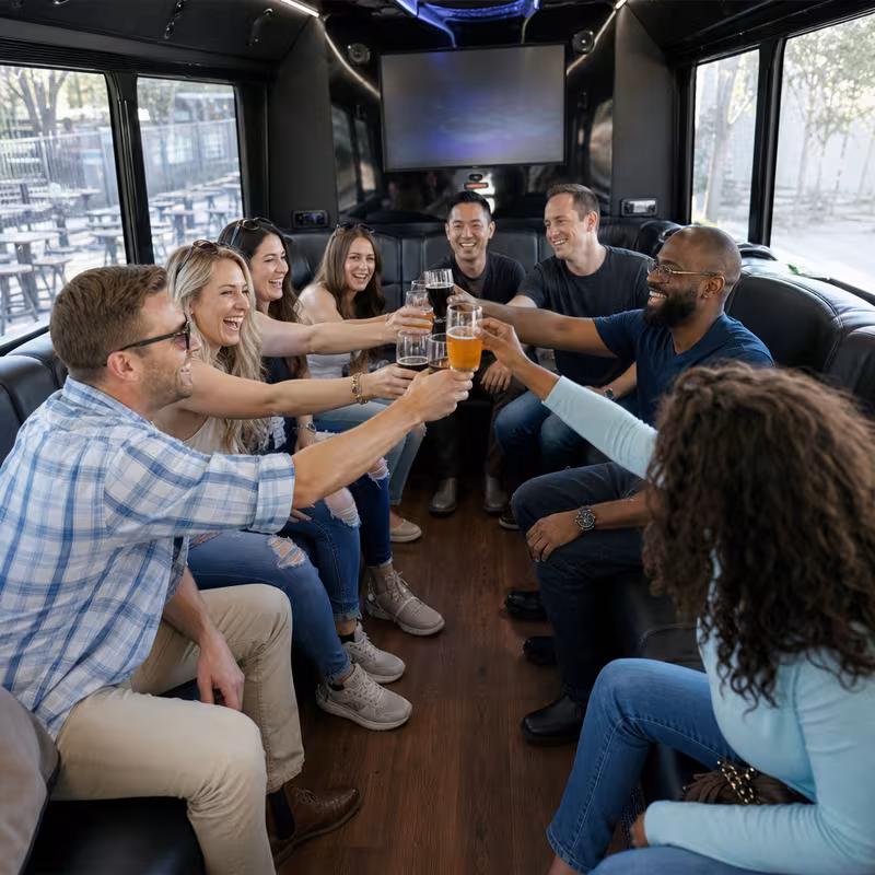 Group boarding a white charter bus for Winery & Brewery Tour Transportation transportation in New York